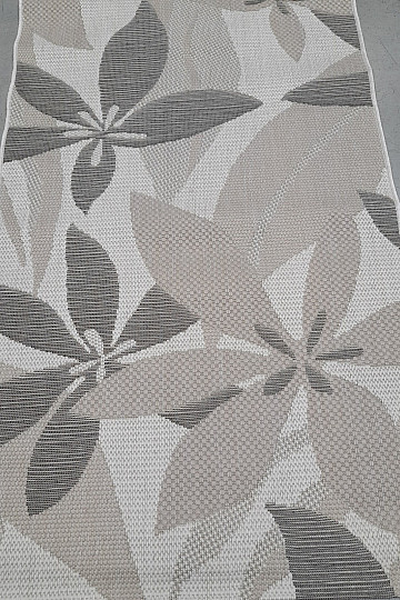 Alfombra de exterior con diseño floral de palmeras