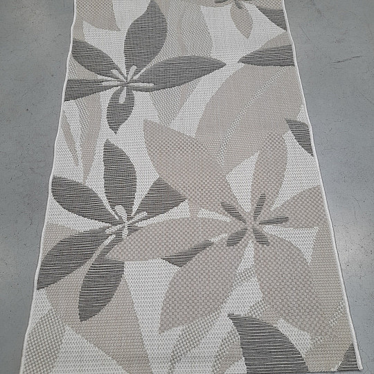 Alfombra de exterior con diseño floral de palmeras