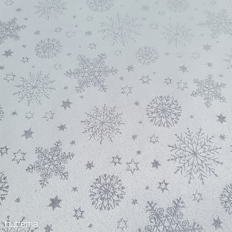 Tela decorativa lisa con estampado de copos de color gris.