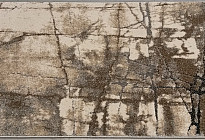 Alfombra en piezas con diseño de mármol.