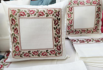 Fundas y manteles bordados estilo campestre.