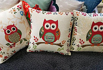 Almohadas con búhos