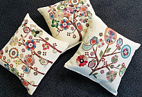 Almohadas con búhos