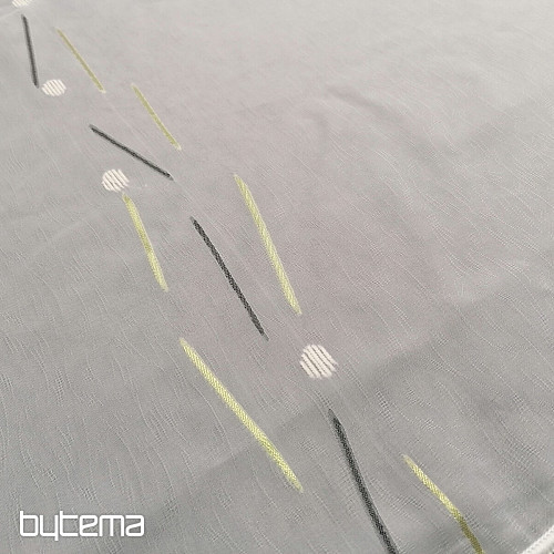 Cortina de gasa blanca con líneas verde-negras.