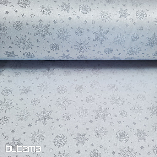 Tela decorativa lisa con estampado de copos de color gris.