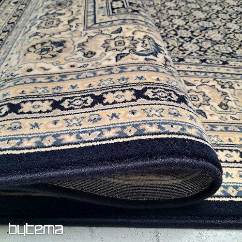 Alfombra clásica de lana ORIENT con estampado azul en toda su superficie