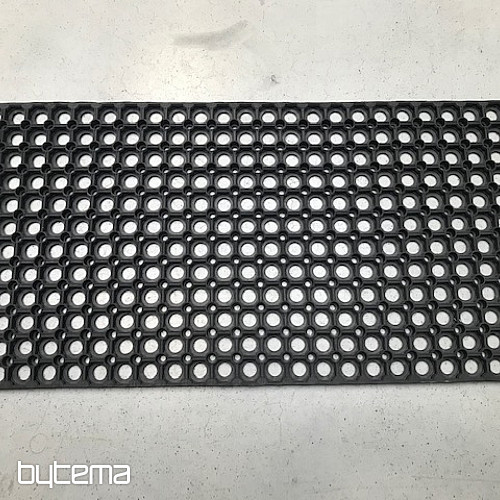 Alfombra de goma negra de goma.